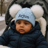 Personalised Blue Hat with White Pom poms