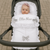 Personalised White Broderie Anglaise Pram Footmuff with Grey Bows