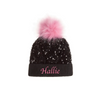 Black beanie with pink pom-pom and 'Hallie' embroidery on a white background