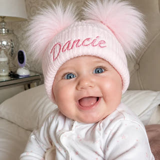 Personalised pink baby double pom pom hat with embroidered name