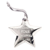 A shiny silver star-shaped ornament with a gray ribbon at the top. This New Bambino Draft piece is engraved with the message: "Little STAR how LOVED YOU ARE" and is perfect as a baby shower present. The ornament features small engraved stars and sparkles, making it a cherished Bambino Silver Plated Star Plaque.