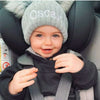 Baby boy wearing a Personalised Grey Pom Pom Hat