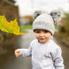 baby boy wearing a Personalised Grey Double Pom Hat