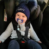 baby boy wearing a Personalised Navy Pom Pom Hat 
