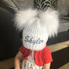 Baby wearing a Personalised White Double Pom Hat