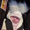 Baby wearing a Personalised White Double Pom Hat